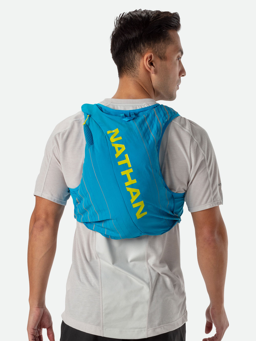 Nathan Sports Veste d'Hydratation Femme - Pinnacle 12L - Vapor Grey/Caribbean Blue Nathan Sports Veste d'Hydratation Femme - Pinnacle 12L - Vapor Grey/Caribbean Blue
